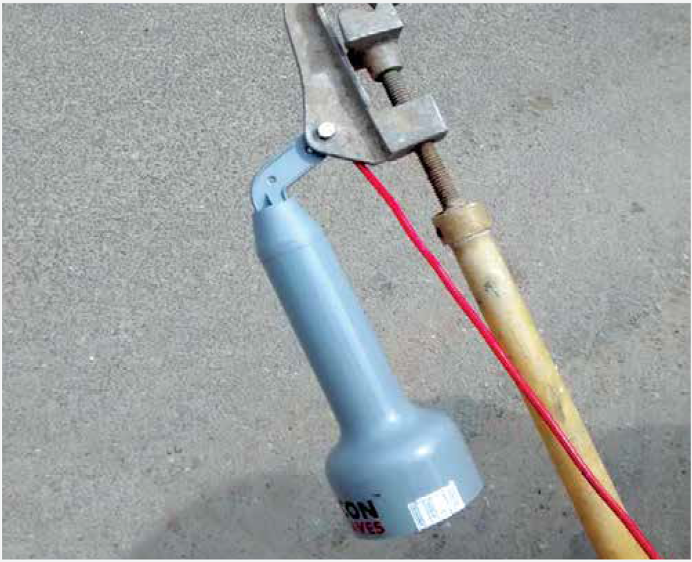 High voltage tester with discharge rod